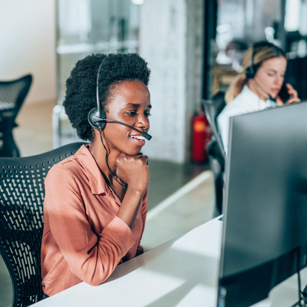 woman on headset giving Juniper third party maintenance